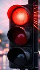 Flashing red traffic signal. Drivers must treat it like a Stop sign. Come to a complete stop, yield to pedestrians and cross traffic, and proceed only when the way is clear and it is safe and legal to continue.